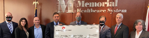 Memorial accepts check for $20 million from JoDimaggio Foindation