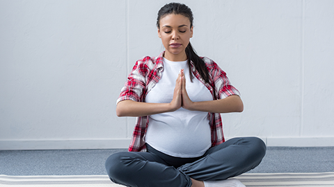 pregnant woman yoga pose