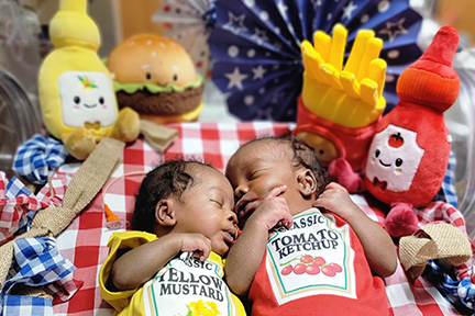 NICU babies dressed as ketchup and mustard for July 4th
