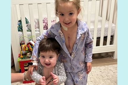 Emilia and Vivian at home post heart surgery