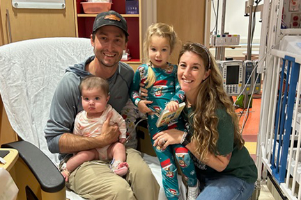 Emilia, Vivian and their parents at Joe D