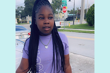 Michaelah as a confident teen.