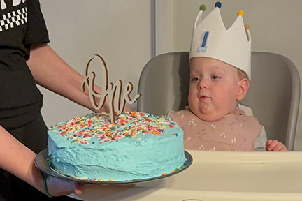 Casey celebrating his one year birthday with birthday cake
