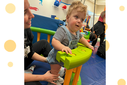 Casey doing physical therapy with therapist