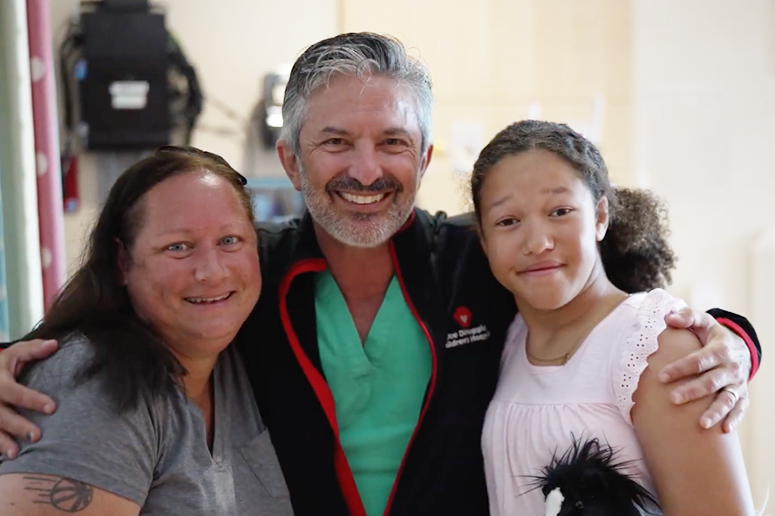 Kelly, ZaNiyah, and Dr. Frank Scholl