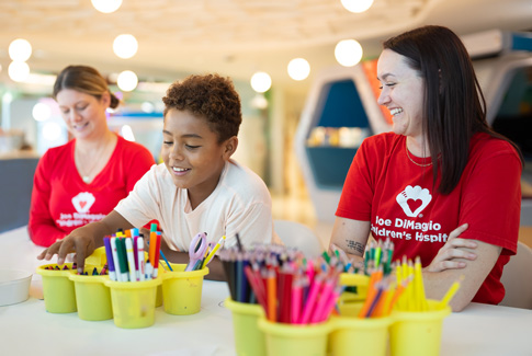 Child Life Specialist with patient during Art Therapy