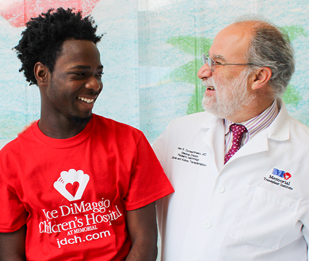 Jermaine, who had a kidney transplant, with Alex Constantinescu, MD